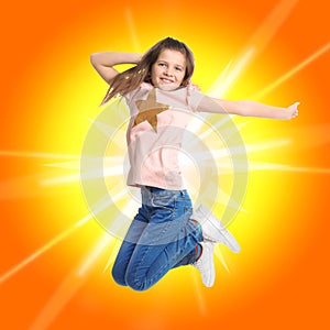 Preteen girl jumping on background. School holidays