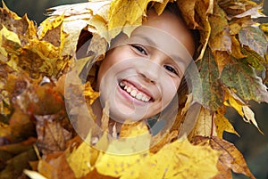 Preteen girl in leaf garland