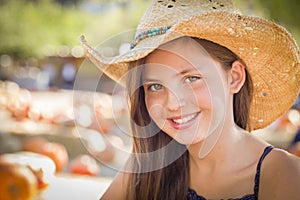 Preteen Girl Portrait Wearing Cowboy Hat at Pumpkin Patch