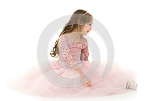 Preteen Girl Posing in Front of Decorated White Christmas Tree