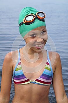 Preteen girl in sea