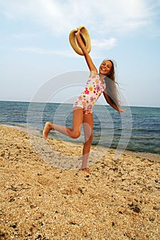 Preteen girl on sea beach