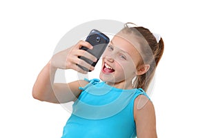 Preteen girl taking self-portrait with mobile phone