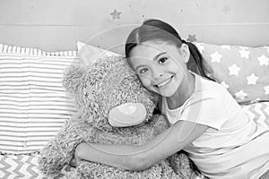 Pretend friend. Happy kid cuddle teddy bear. Little girl smile with toy friend. Friend and friendship. Adoption and