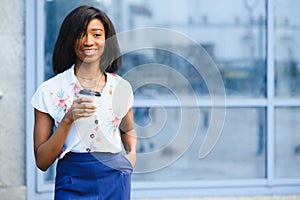 A pretty african american business woman at her office building