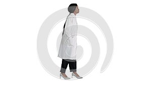 Pretty african american female doctor posing on white background.