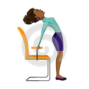Pretty African American woman doing exercises for back on the office chair. Business woman in healthy backbend pose.
