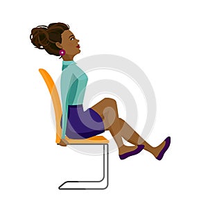Pretty African American woman doing exercises for back on the office chair. Business woman in strengthening legs pose.