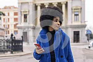 Pretty Afro Girl Using Phone