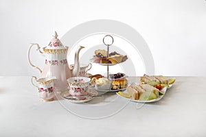 Pretty afternoon tea on white background