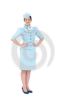 Pretty air hostess smiling at camera