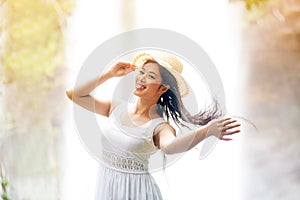 A pretty Asian woman jerking her hair. photo