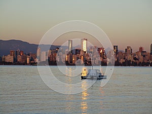 Pretty autumn sunset over downtown Vancouver skyline at Jericho beach, Vancouver, Canada, 2018