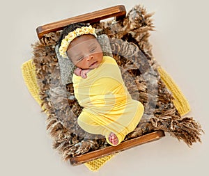 Pretty baby in cradle