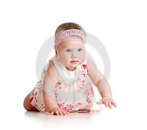 Pretty baby girl crawling on floor