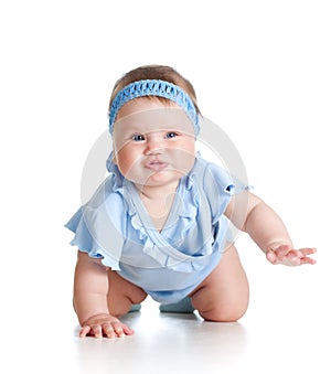 Pretty baby girl crawling on floor