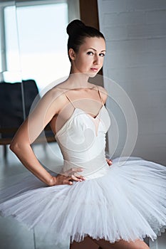 Pretty ballerina looking at camera.