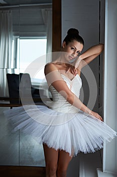 Pretty ballerina looking at camera.