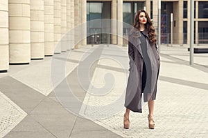 Pretty beautiful business woman in elegant black dress