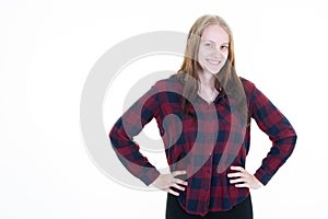 Pretty beautiful young blonde woman hands on hips looking at the camera smiling blond girl isolated on white background