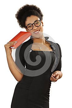 Pretty black girl in glasses with a notebook and pen in the hand