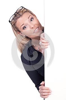 Pretty blond woman with a blank white sign
