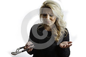 Pretty Blonde Girl Confused Flusted by Pliers Tools