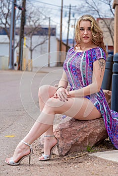 Pretty blonde girl woman in dress