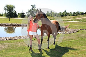 Pretty Blonde High School Senior Girl Outdoor with Horse