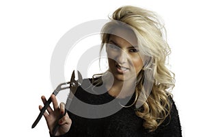 Pretty Blonde Snarling Mean Face Holding Pliers Isolated Background