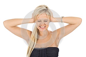 Pretty Blonde Woman Blocking Ears