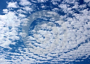 Pretty blue skies with wispy white clouds overhead