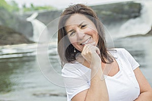 Pretty brunette adult woman portrait smiling outside