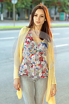 Pretty brunette in flowered blouse