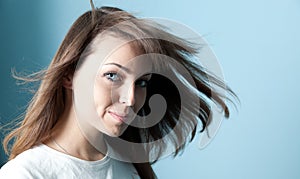 Pretty brunette wind portrait