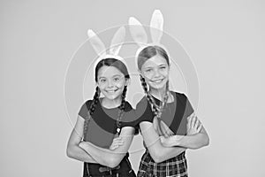 Pretty bunny. Entertainment and event concept. Spring holidays. Children in rabbit bunny ears. Family and sisterhood