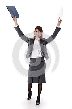 Pretty business woman celebrating success