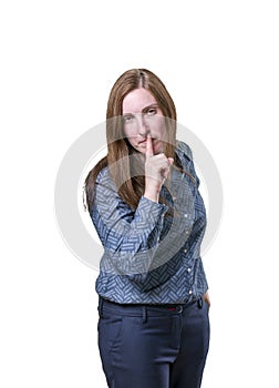 Pretty business woman making silence gesture over white background.