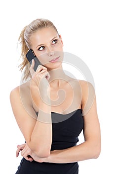 Pretty business woman talking on the mobile phone