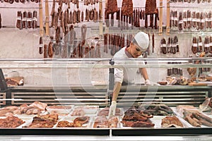 Pretty Butchery Woman working.