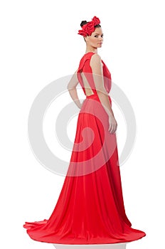 Pretty caucasian model in red long evening dress isolated on whi