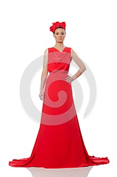 The pretty caucasian model in red long evening dress isolated on whi