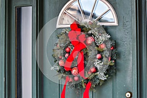 Pretty Christmas Wreath on a Green Door