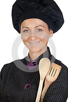 Pretty cook girl with wooden cookware