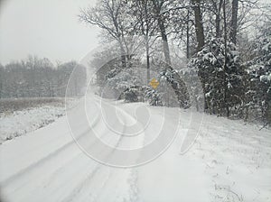 Pretty country winter scenery during snowstorm