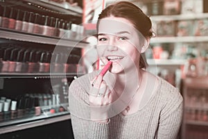 Pretty customer searching for reliable lipstick