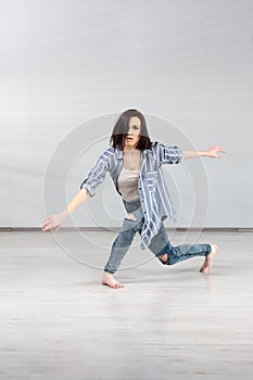 Pretty dancer girl in movement.