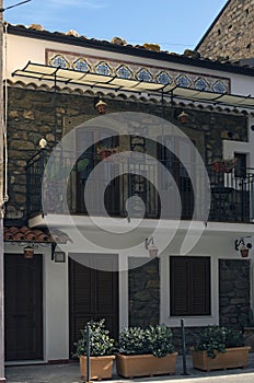 Pretty decorated vintage two-storey residential cobblestone house in Santo Stefano di Camastra