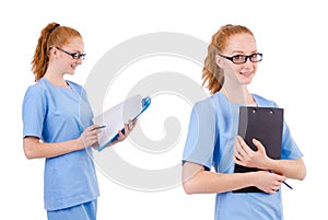 The pretty doctor in blue uniform with documents isolated on white