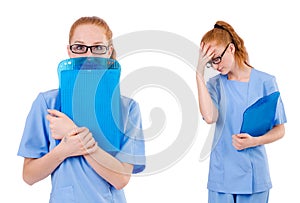 The pretty doctor in blue uniform with documents isolated on white